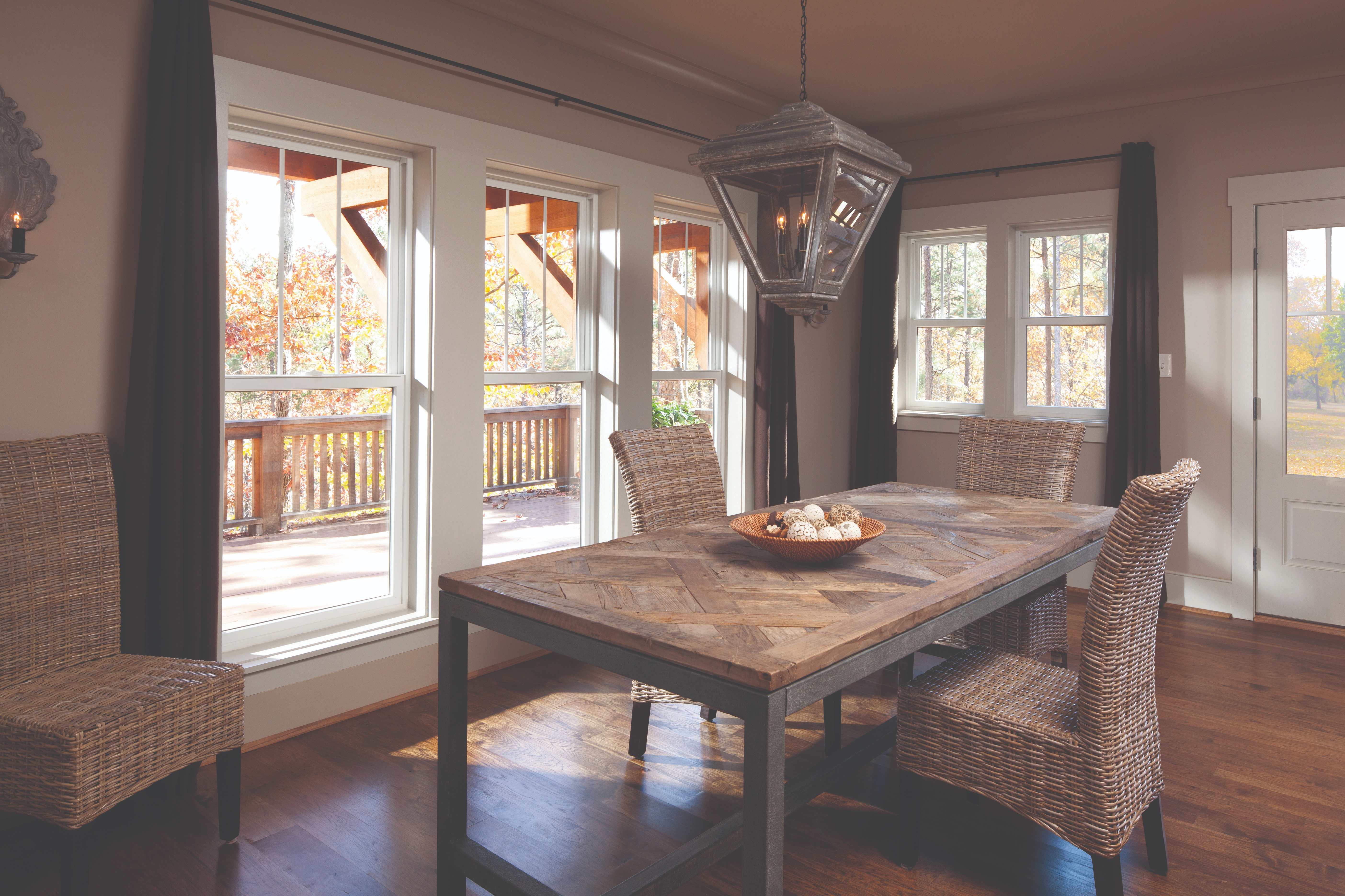100 Series Single-Hung Windows - Dining room with fall foliage views